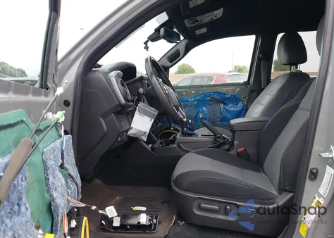 2023 Toyota Tacoma Trd Off Road from USA, damaged, VIN 3TMDZ5BN3PM159230